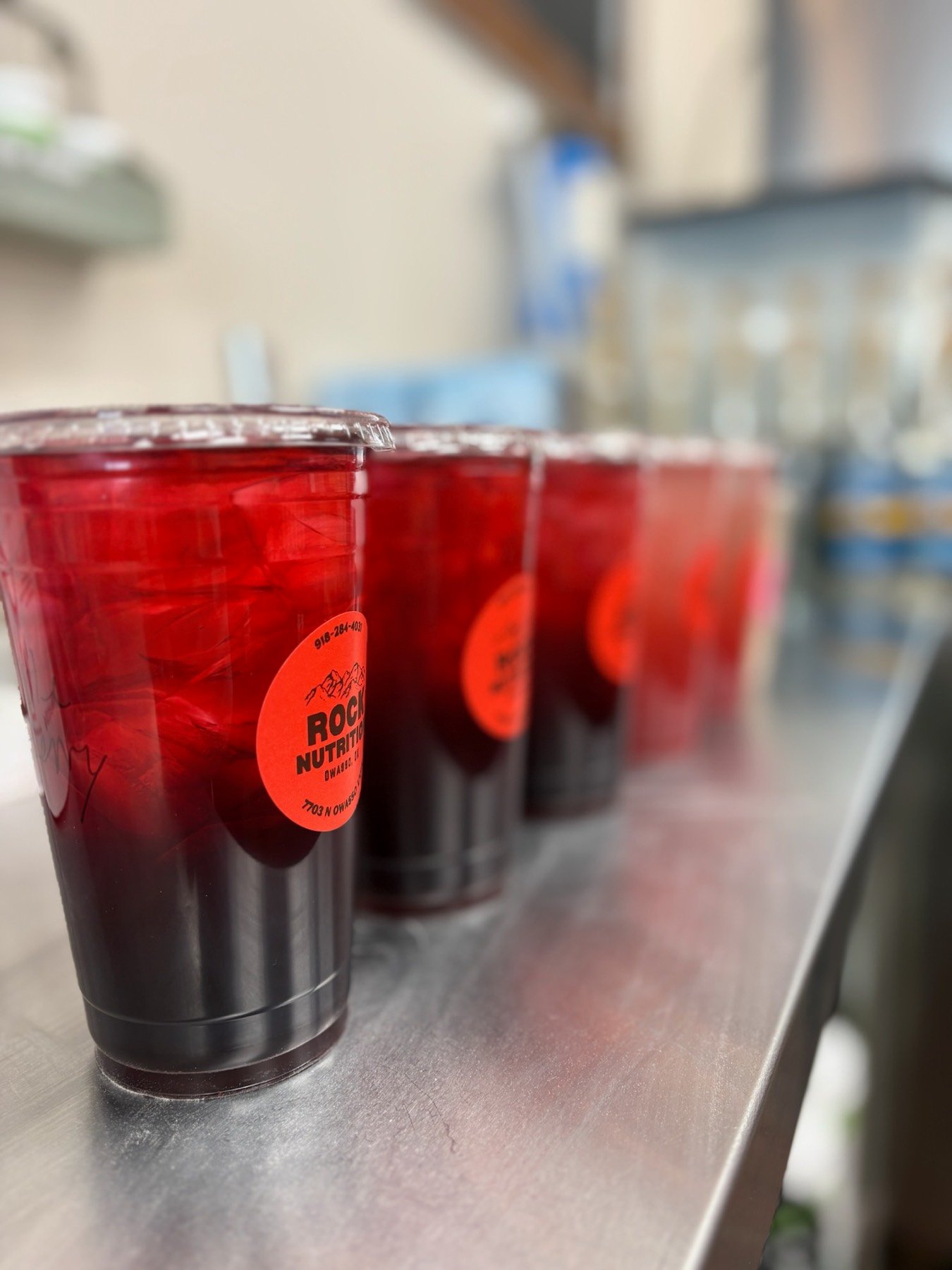 A row of caffeine-free refreshers lined up on the counter